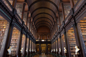 The Long Room in the Trinity College Library on Feb 15, 2014 in Dublin, Ireland. Trinity College Library is the largest library in Ireland and home to The Book of Kells.
