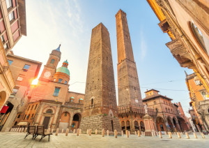 Two famous falling towers Asinelli and Garisenda in the morning, Bologna, Emilia-Romagna, Italy