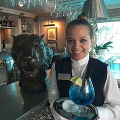 Fine dining, great service: Ariella serves up a blue gin and tonic, Uniworld style. © 2015 Ralph Grizzle